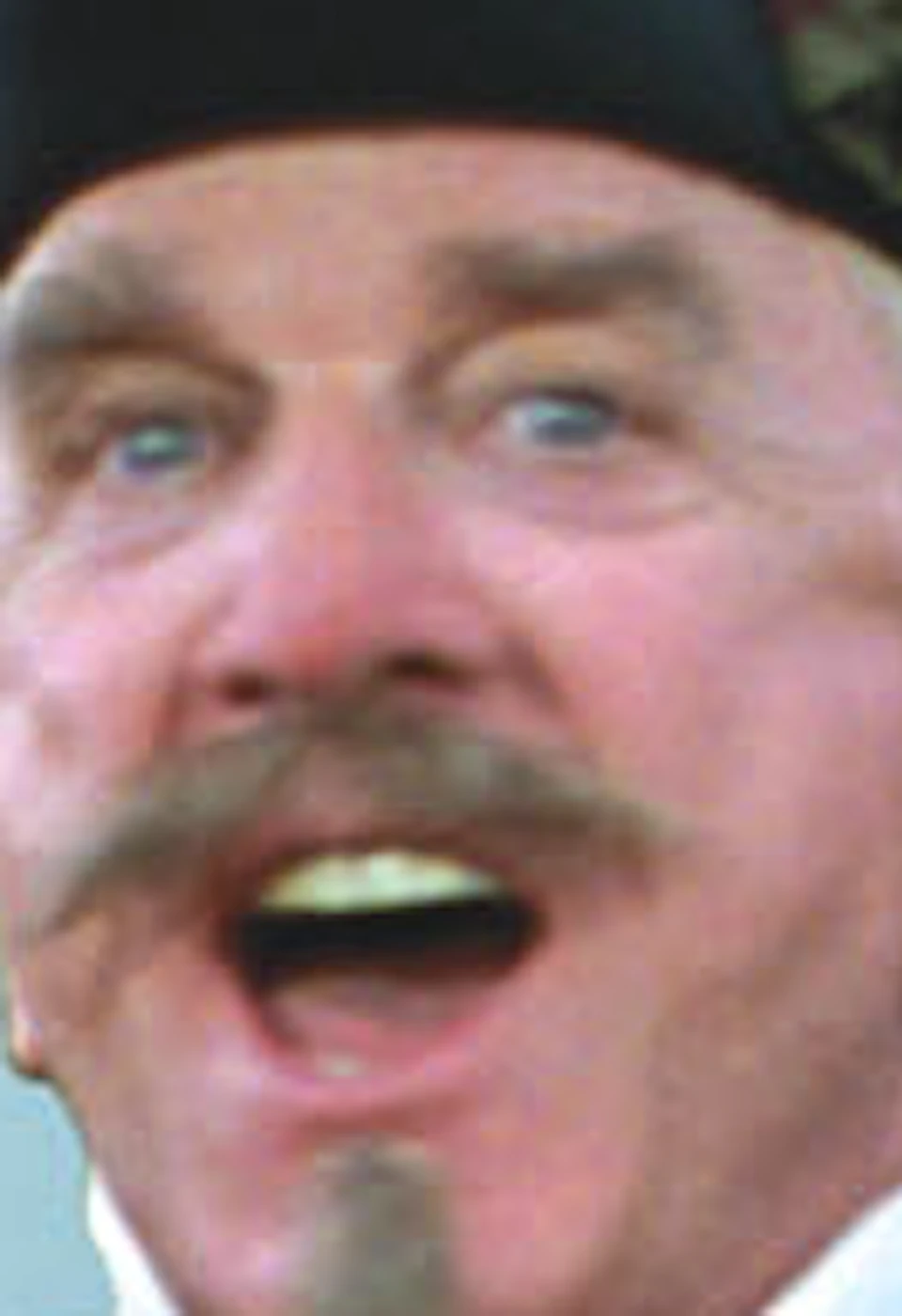 A pirate with a red coat and black hat points forward with a joyful expression. Large "Pirates 4D" text above him with a sword image.