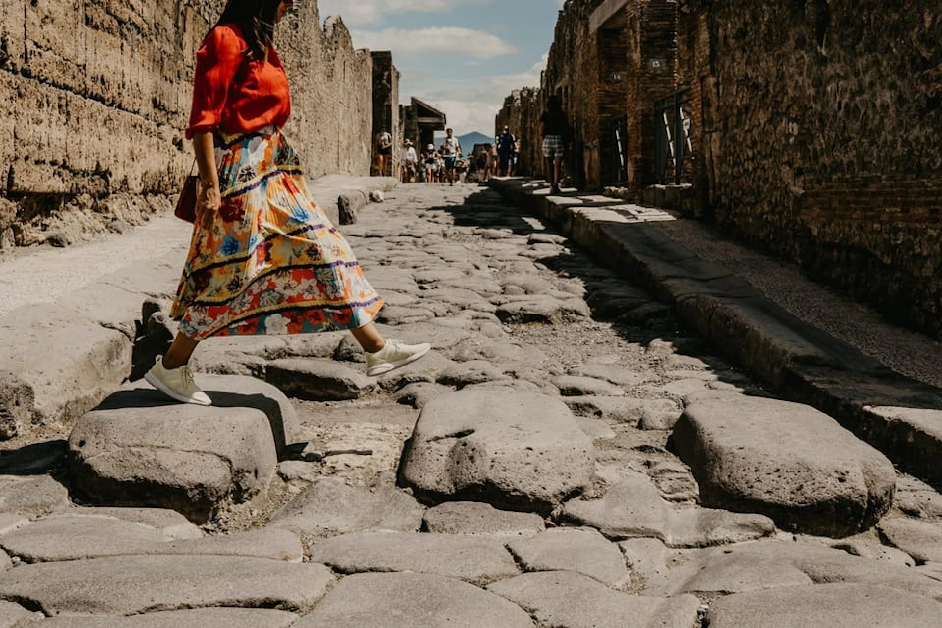 Pompeii ancient road with tourists