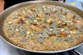 Valencian paella with chicken, rabbit and vegetables.