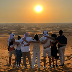 Dubai Evening Desert Safari: Sandboarding, Camel Ride + BBQ Dinner