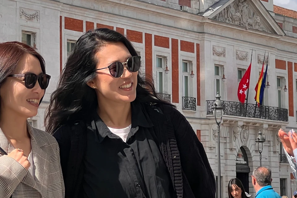 Group walking the streets of Madrid.