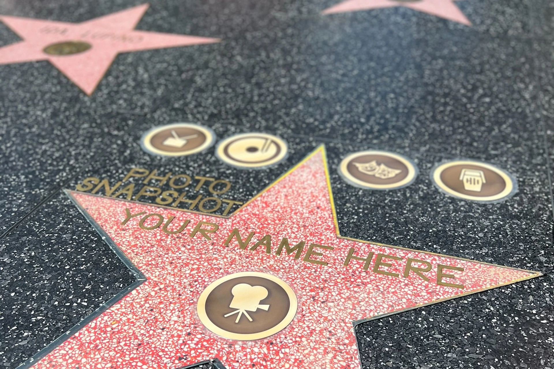A Hollywood Walk of Fame area with a replica star for taking photos with own personalized star #Memorabilia