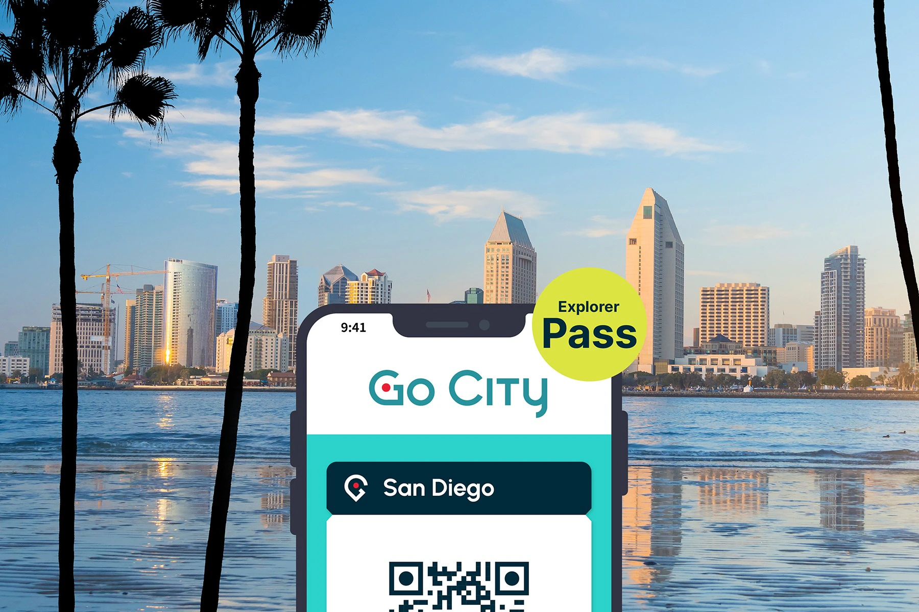 San Diego Explorer Pass by Go City displayed on a smartphone with the city skyline and harbour in the background