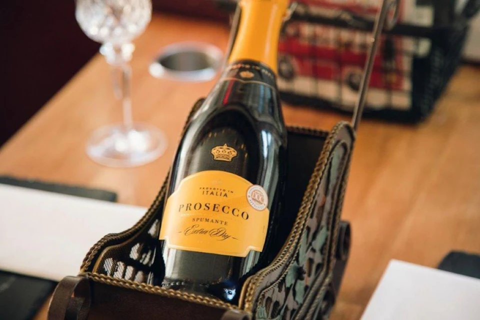 Bottle of prosecco from our fully licensed bar on board.