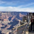 view of grand canyon with tourists on the lookout