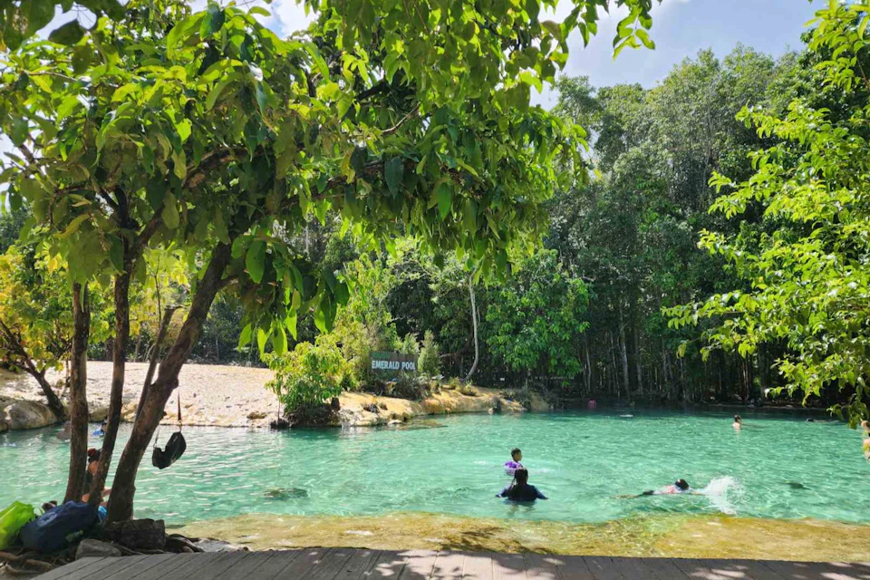 Swim in the turquoise waters of the stunning Krabi Emerald Pool