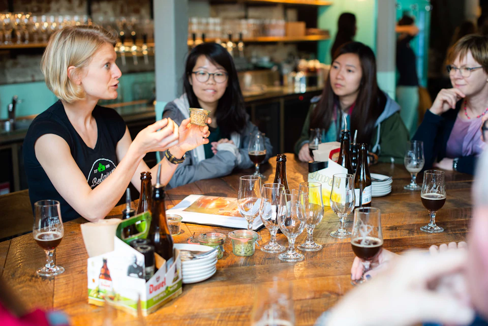 Founder Liselot, explaining and narrating stories to customers.