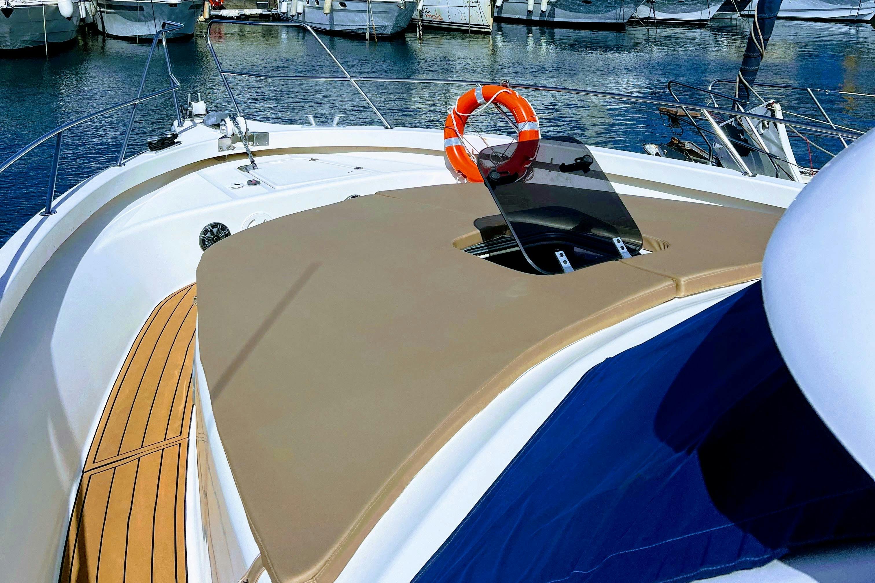 Portside walkaround + bow sunbed