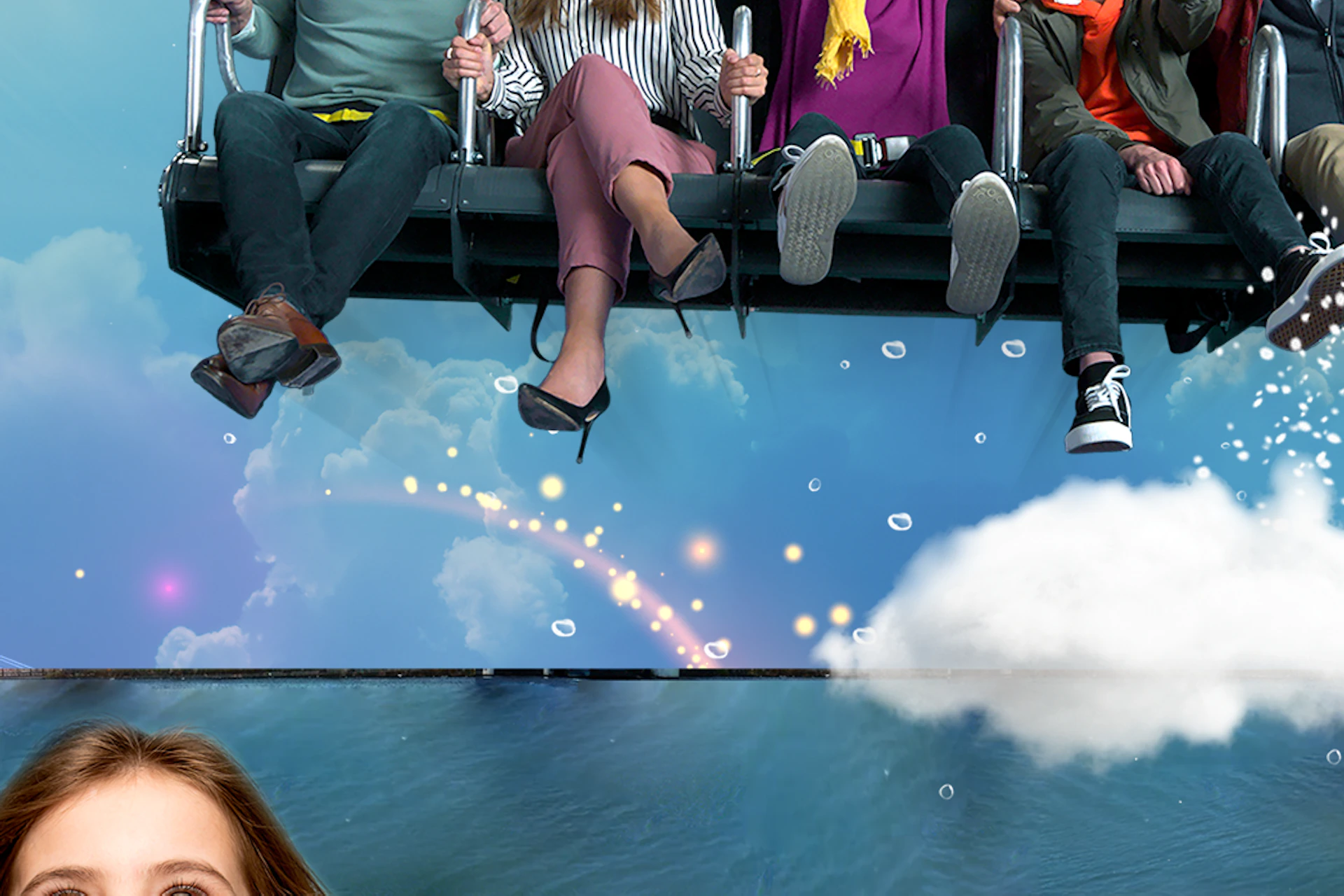 Happy passengers on a thrilling simulator ride above an animated landscape with a young girl watching excitedly below.