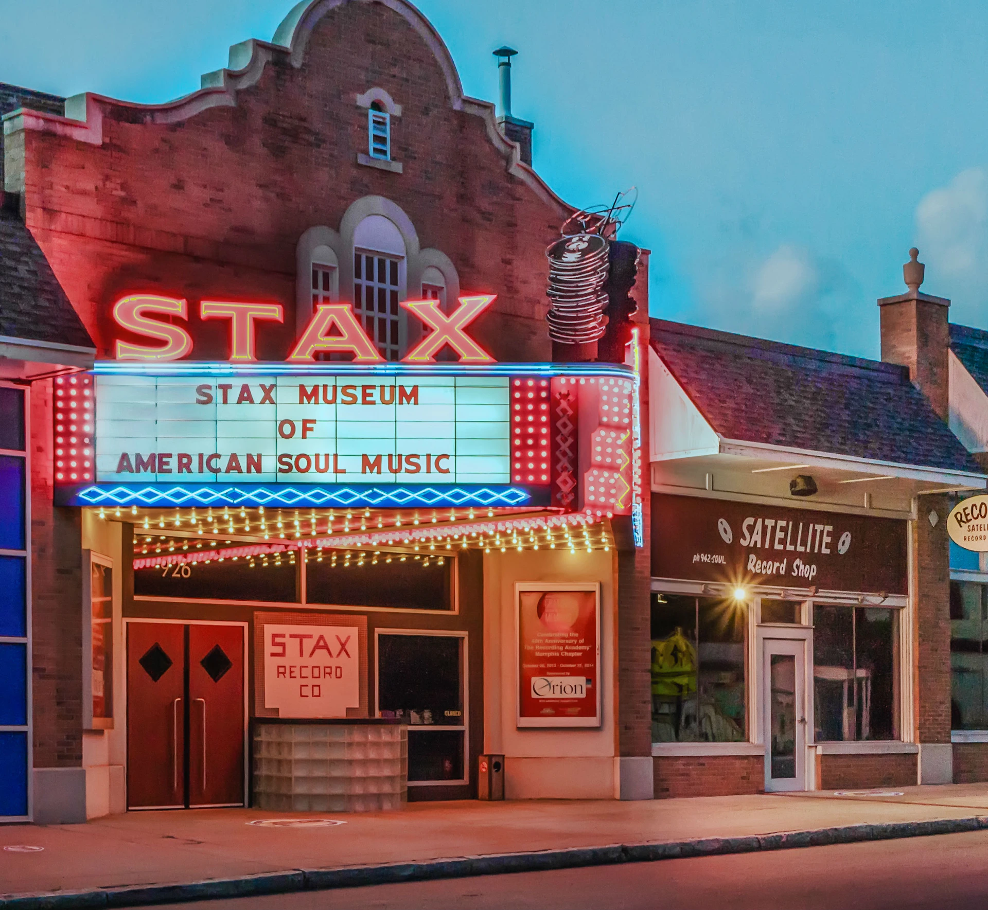 Historic building with a marquee reading "Stax Museum of American Soul Music." Next door is Satellite Record Shop.