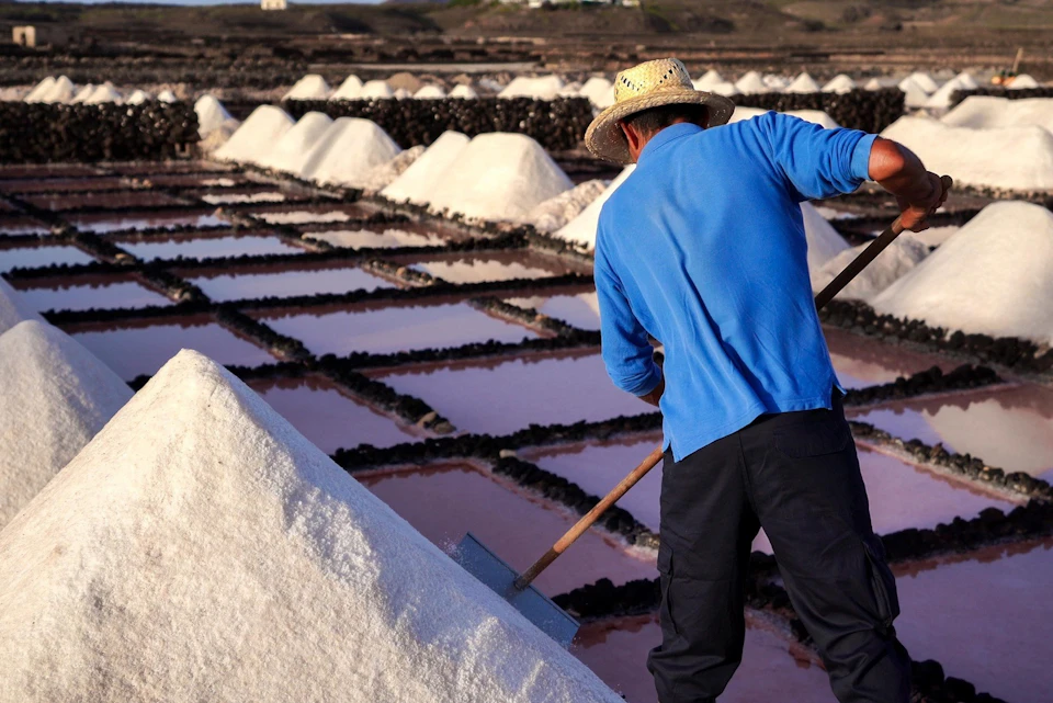 Salinero working in Salinas de Janubio.