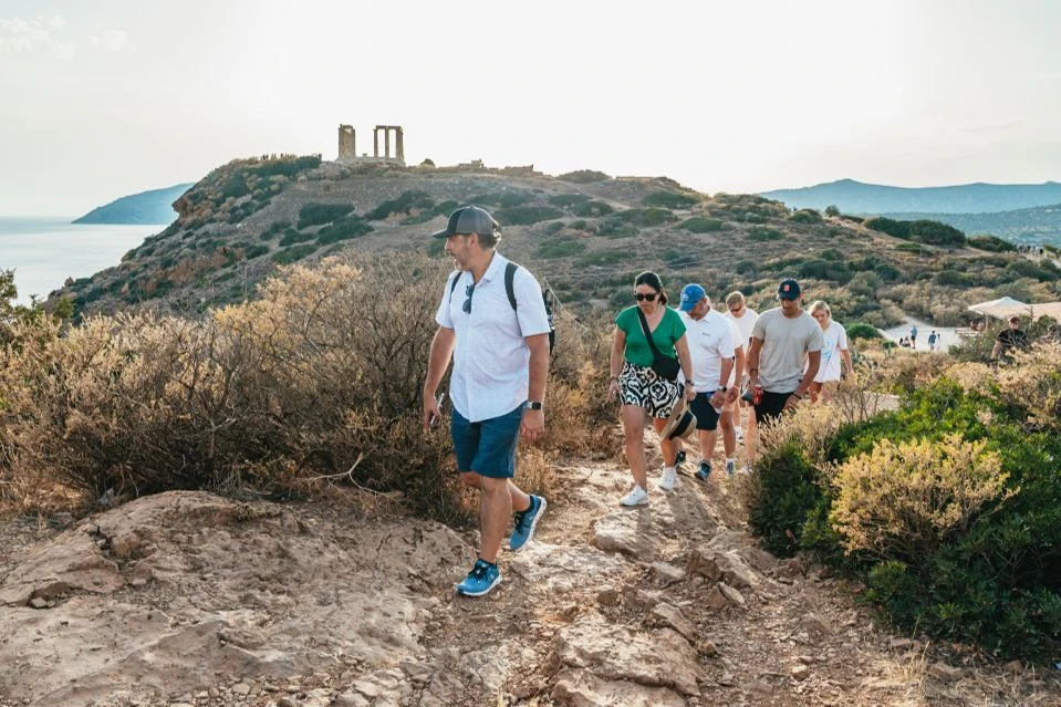 Our guests are walking up to the hill of the Temple of Poseidon.