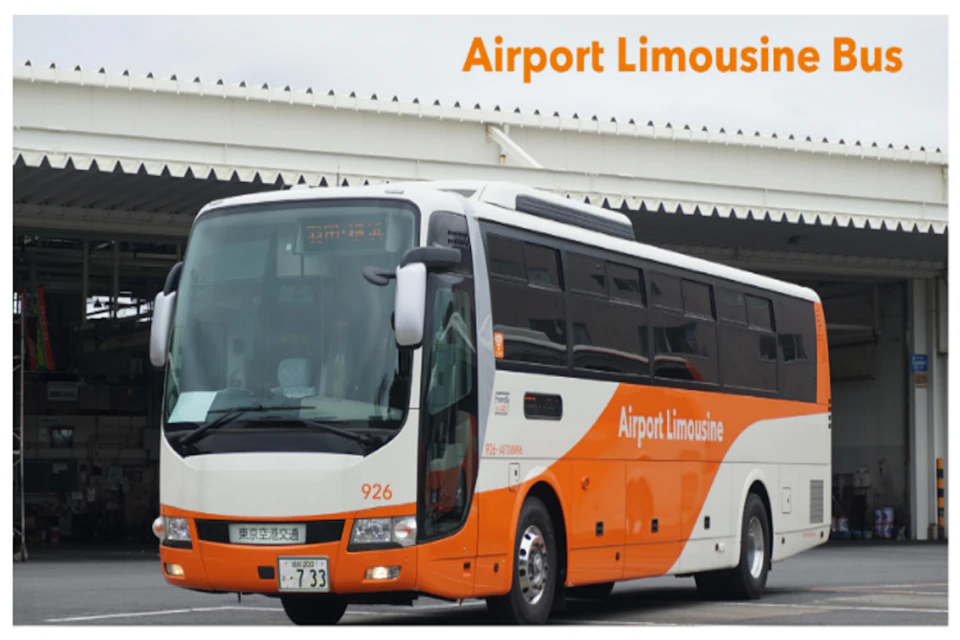 An orange and white bus labeled "Airport Limousine" parked near a building with a corrugated roof.