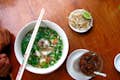 Enjoy a steaming bowl of savory noodle soup or pork rice.
