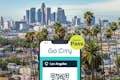 Los Angeles Explorer Pass de Go City affiché sur un smartphone avec la ville de Los Angeles en arrière-plan.