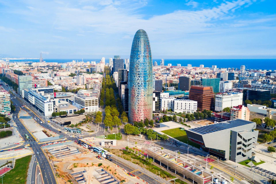 The Agbar Tower is a 34-story skyscraper, standing at 145 meters tall, located in Barcelona.