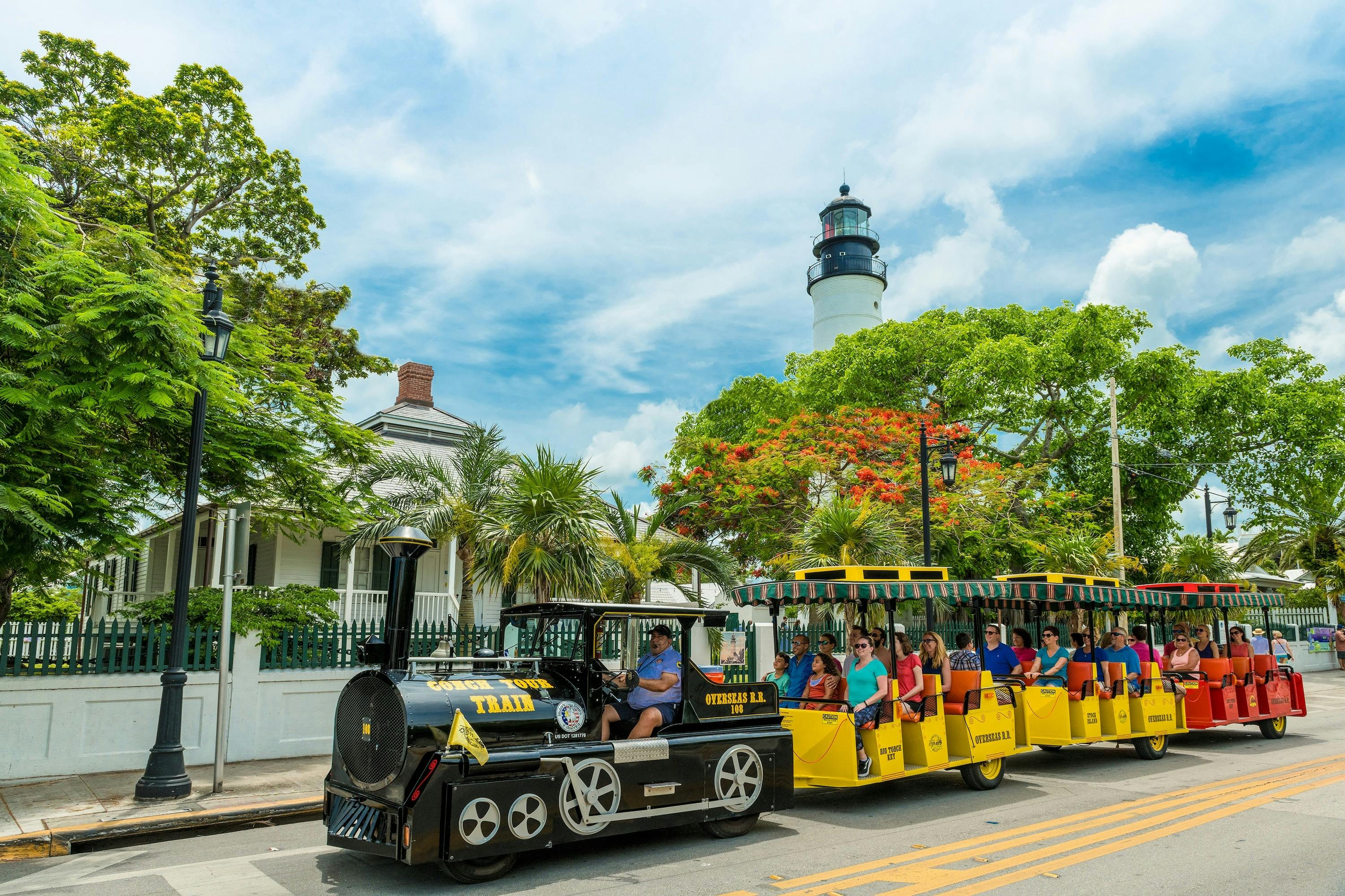Conch Train passing by the Lighthouse