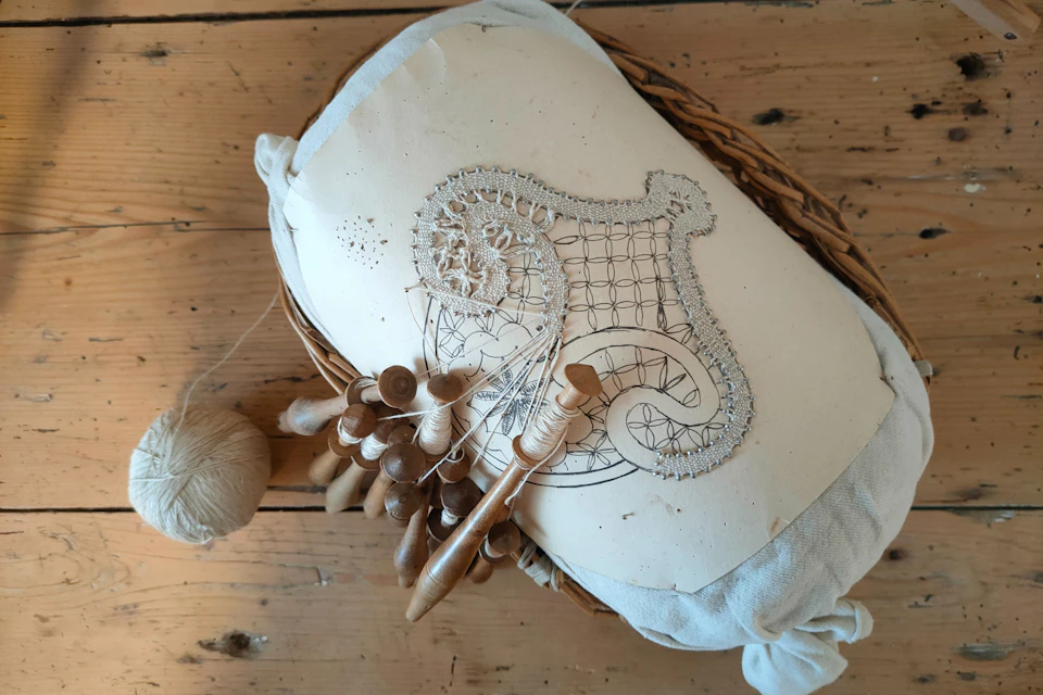 The ancient art of bobbin lace, also known as pillow lace