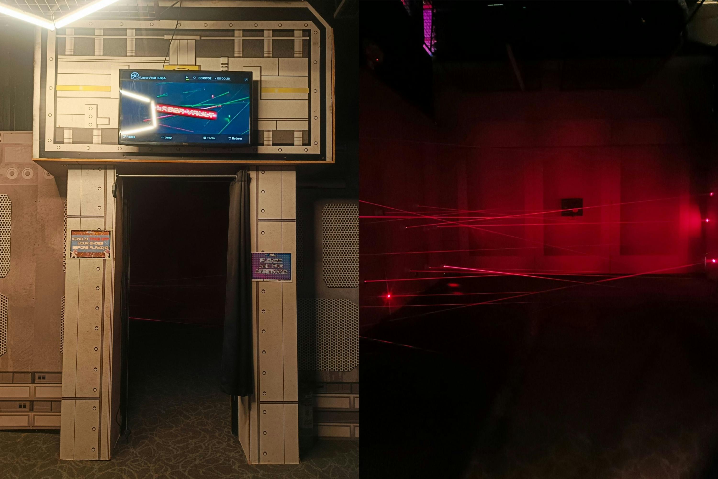 A laser maze area with a monitor displaying the game, and red laser beams visible in a dark room.