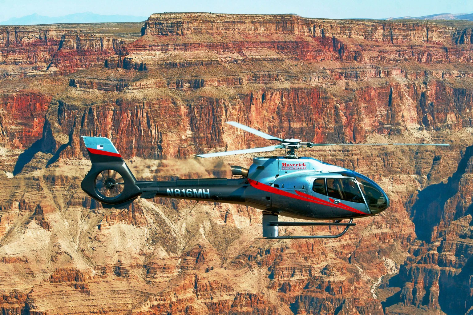Grand Canyon: Day or Sunset Helicopter Flight with Landing + Snack & Champagne
