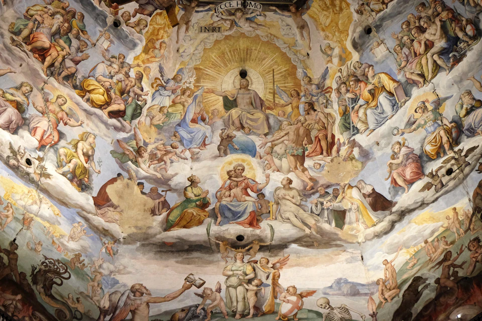 A detailed fresco depicting a divine scene with numerous figures, a radiant central figure, and surrounding clouds and symbols.