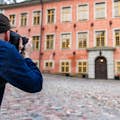 Guest photographing the facade of the Stenbock Palace on Riddarholmen