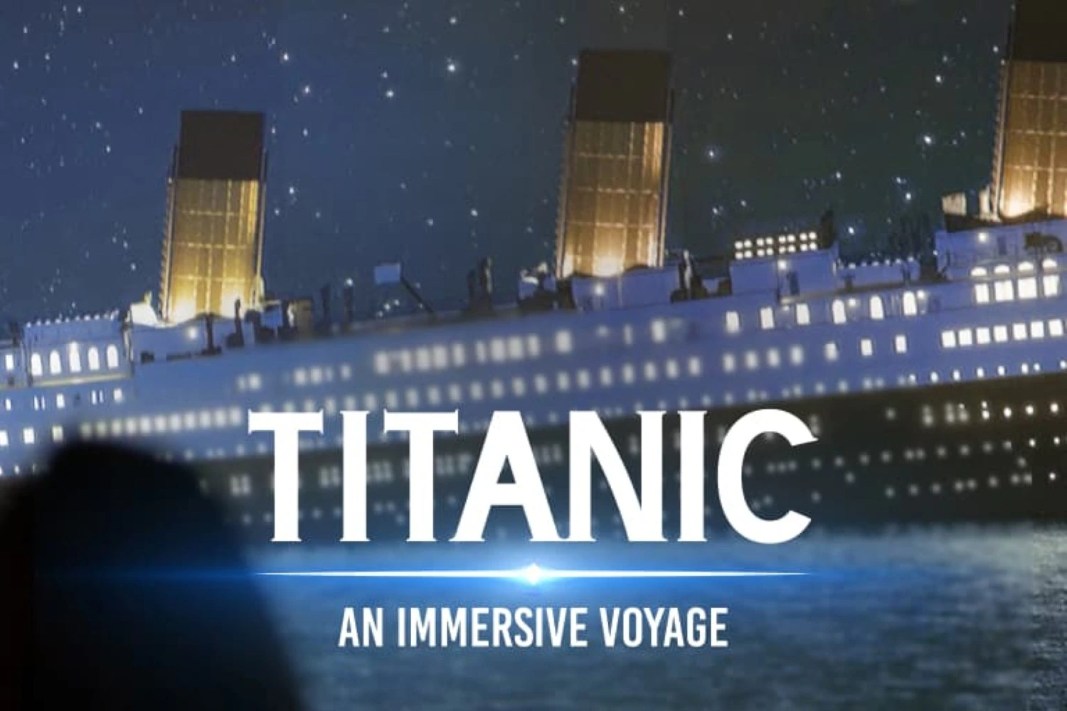 A night view of the Titanic with illuminated windows, accompanied by the text "TITANIC: An Immersive Voyage."