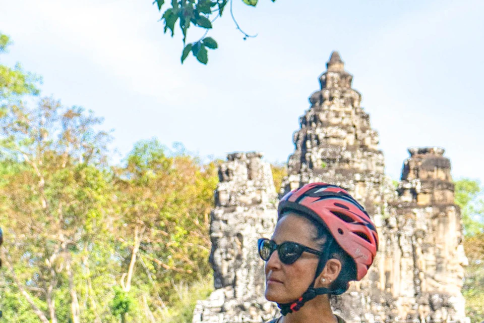 Explore the fascinating beauty of Bayon Temple, Terrace of Elephants, and Baphoun Temple at the Angkor Thom complex.