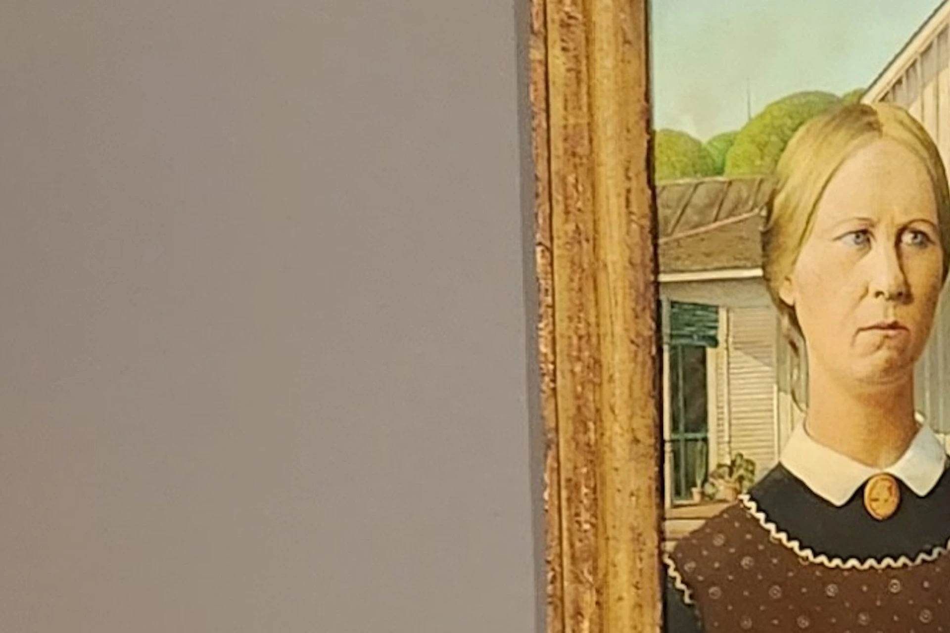 Guide showing Grant Wood's American Gothic