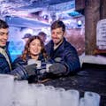 friends with frozen glasses at the ice bar