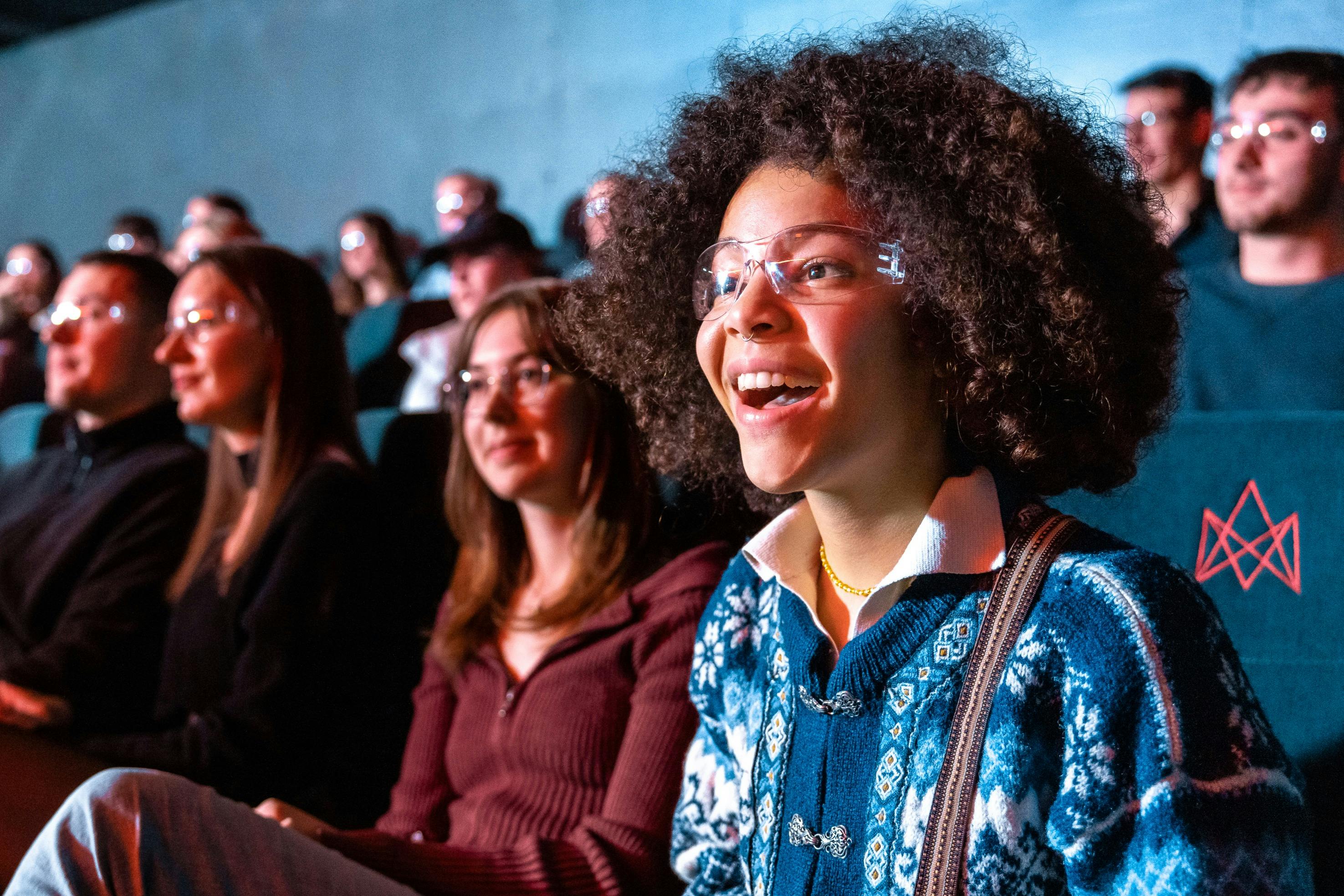 A young boy is thrilled by watching lava flow indoors at the Lava Show. 