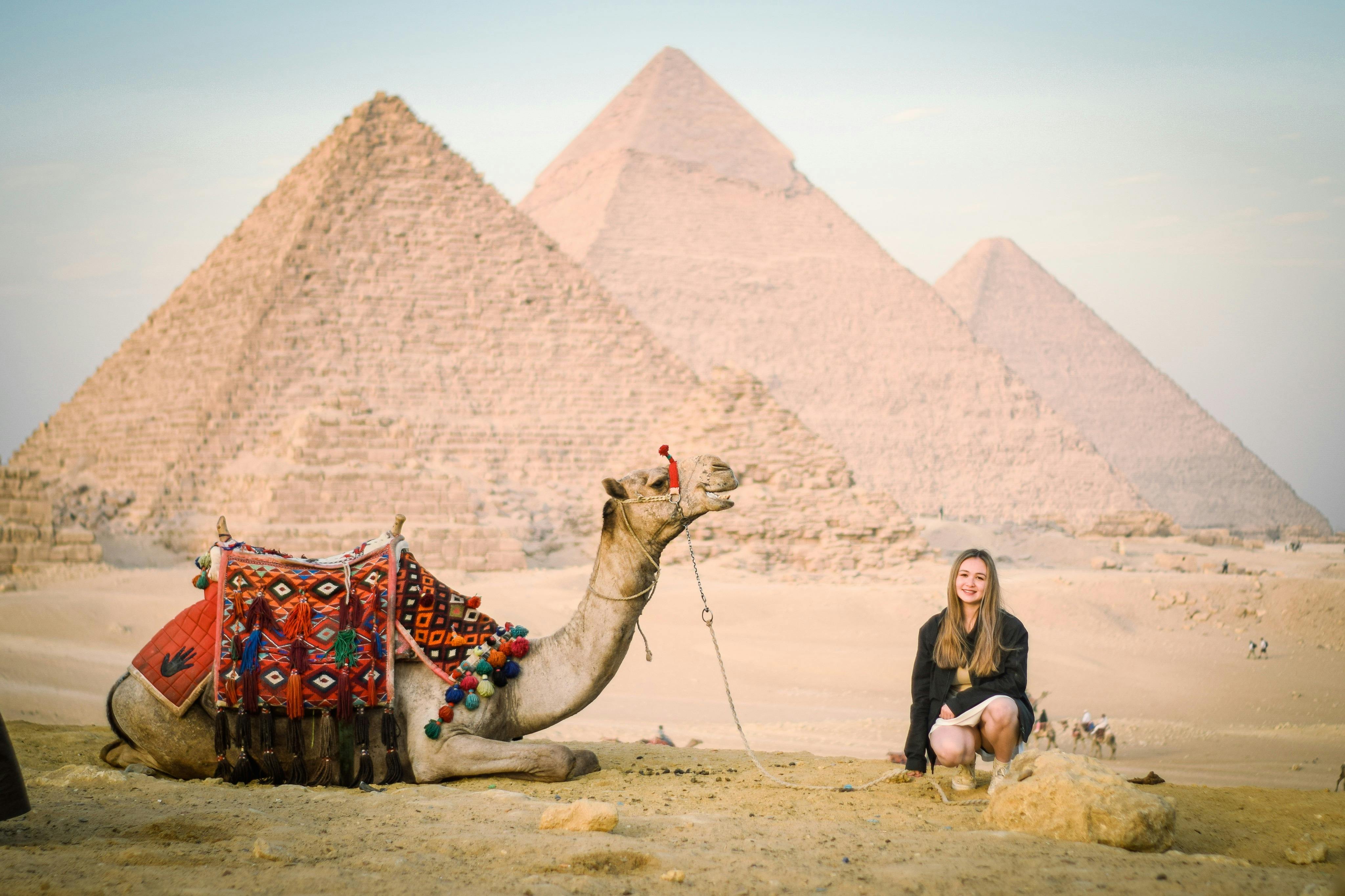 Half-day private Giza tour: Pyramids, Sphinx, camel ride, photos, hotel pickup & expert guide.