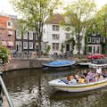 「Open boot door de Amsterdamse grachten」