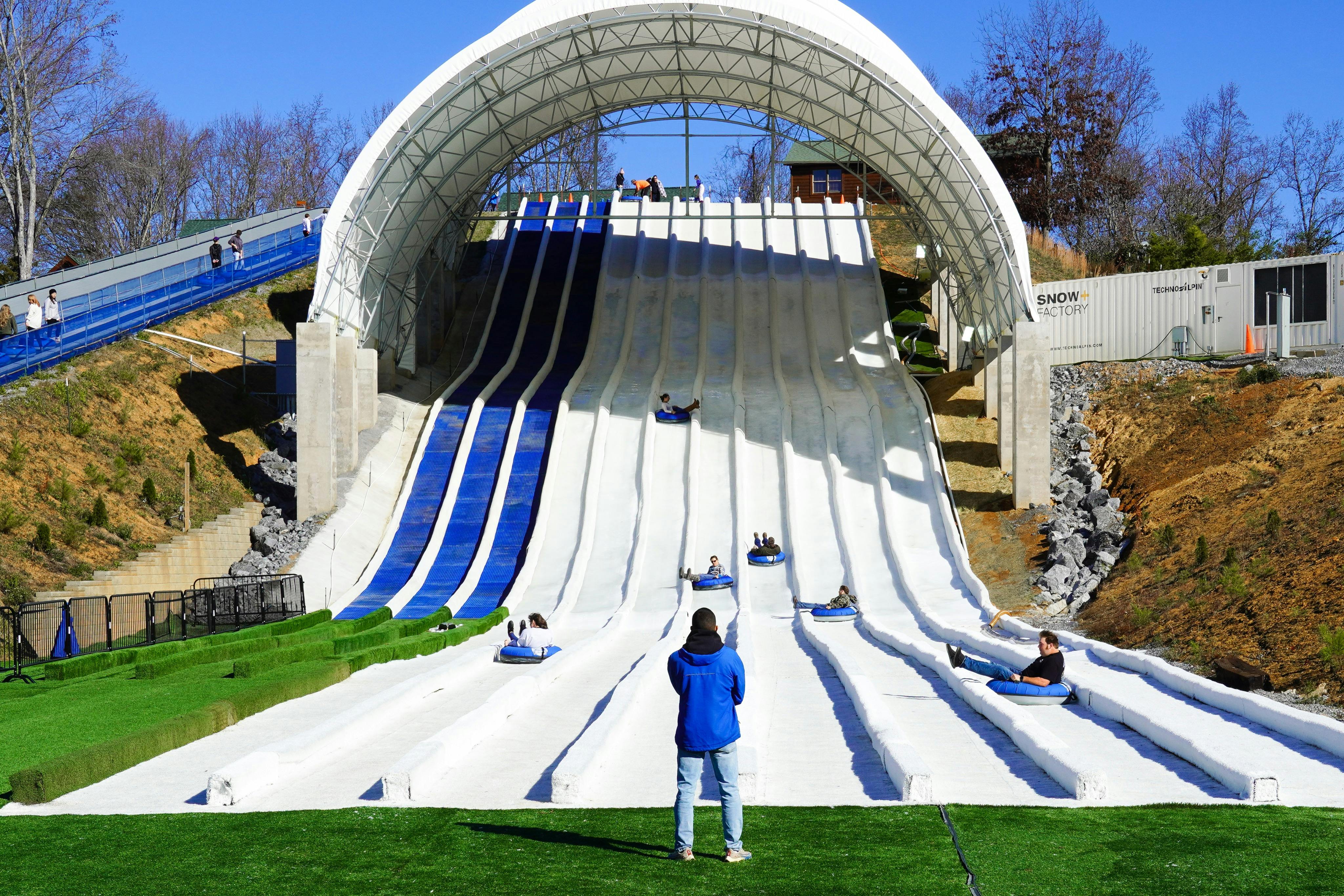 Guests enjoy our blue, summer tubing lanes during the summer months.