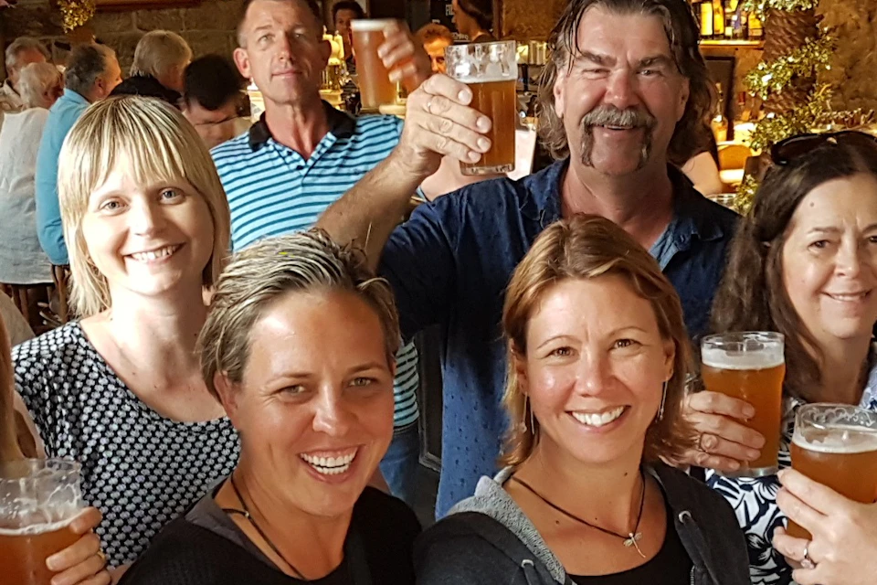 A group of guests enjoying a drink inside at The Lord Nelson Brewery Hotel