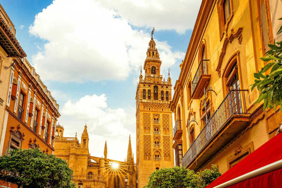 Giralda tower facade with sunrise