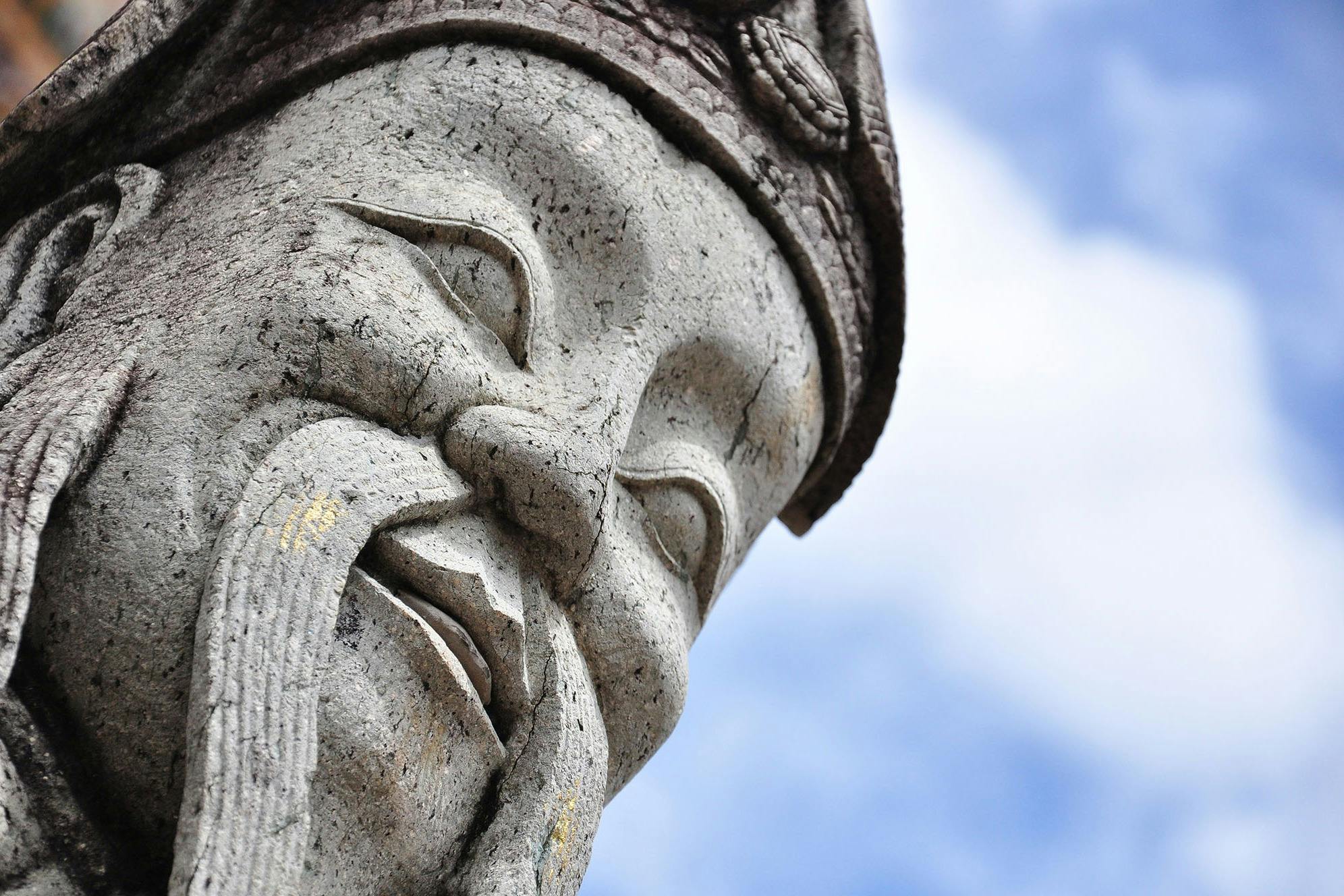 One of the statues in Wat Arun