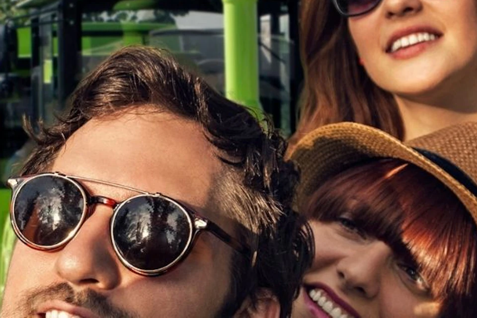 A group of friends taking a selfie in front of the City Train