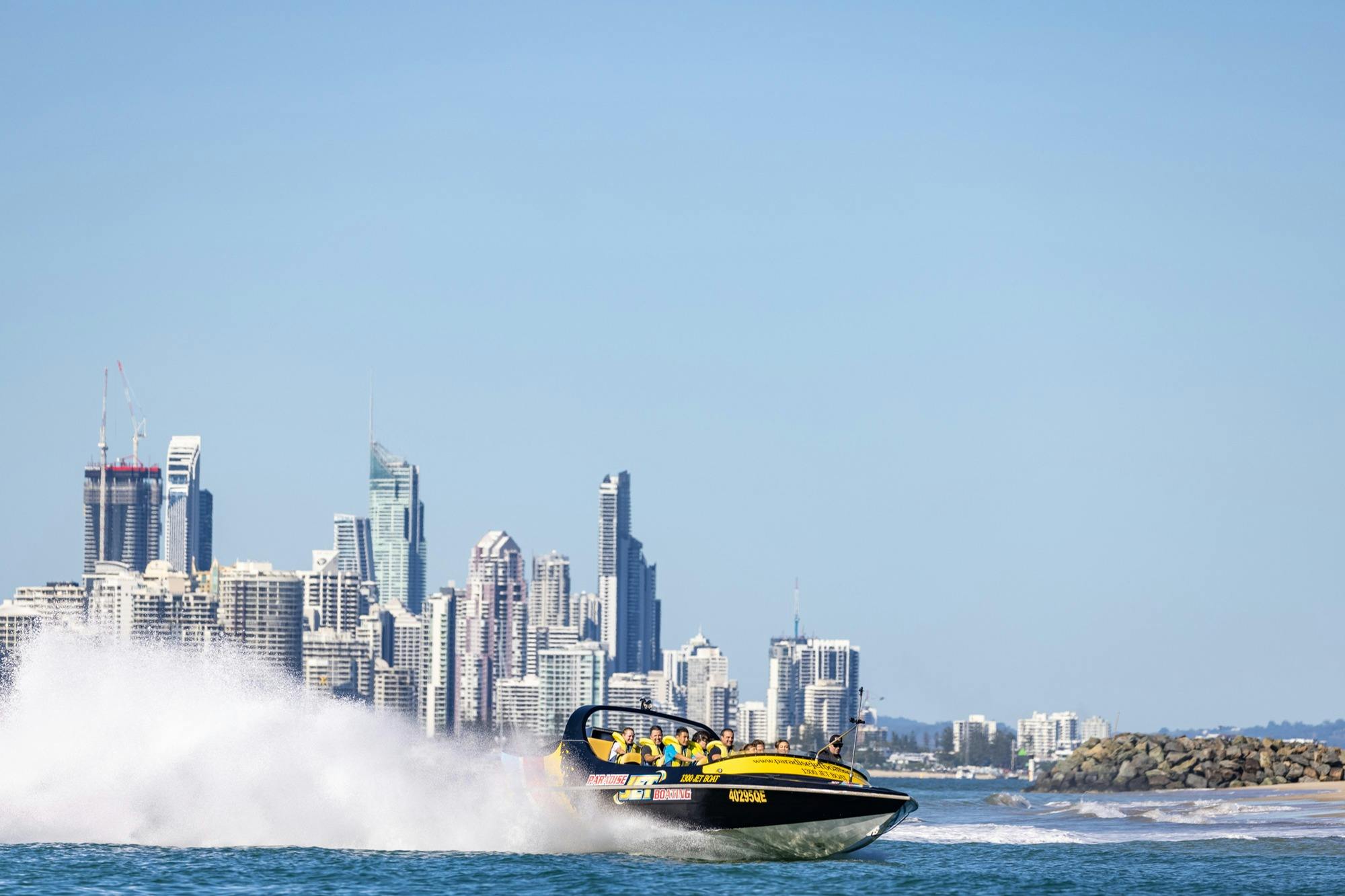 Jet boat with city
