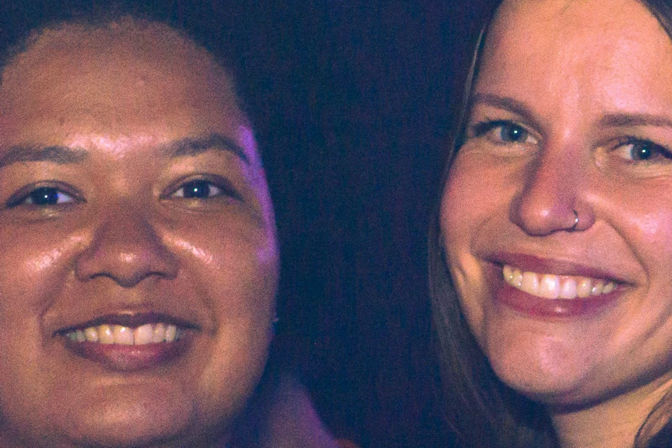 Photos of two guests posing together
