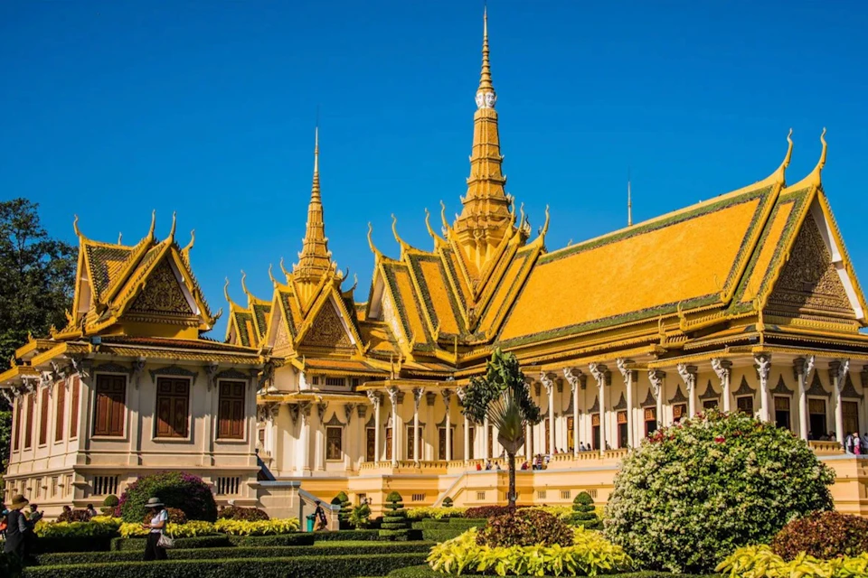Discover the city of Phnom Penh on the back of a Vespa.