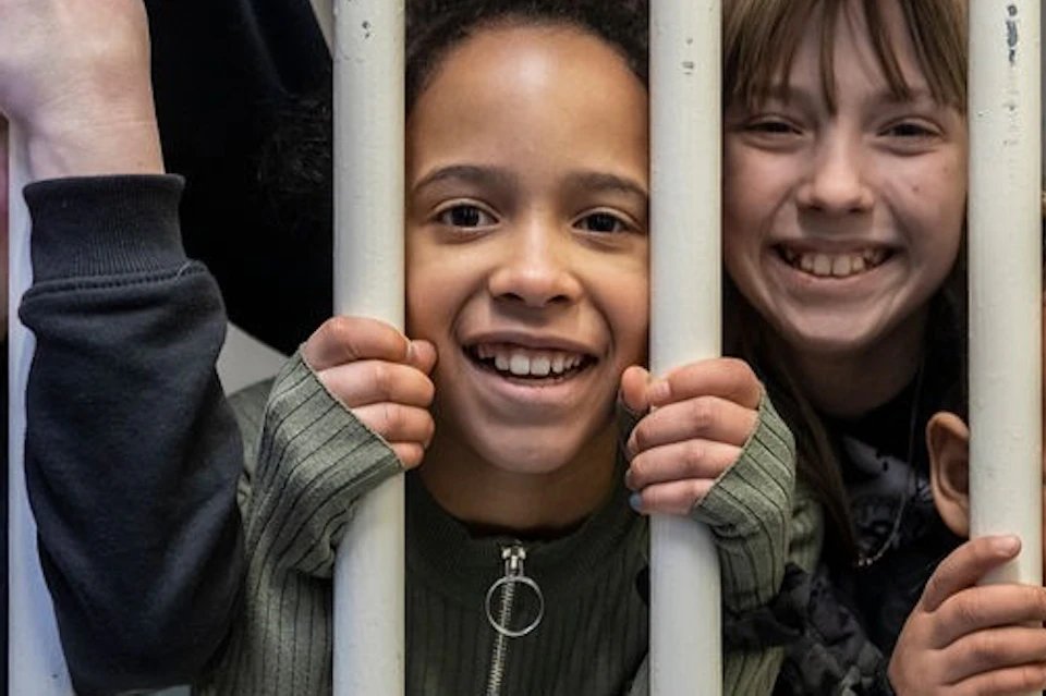 behind prison bars