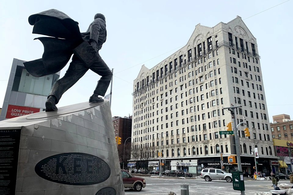 Hotel Theresa and Statue of Adam Clayton Powell, Jr.
