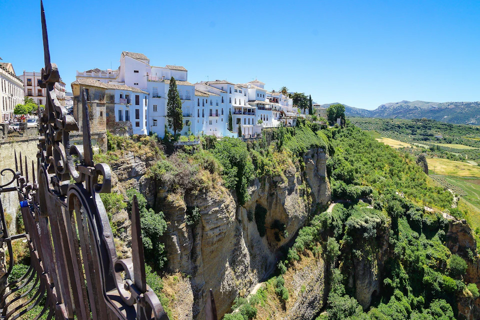 A panoramic view of Ronda’s Tajo Gorge and the whitewashed houses on the cliff.