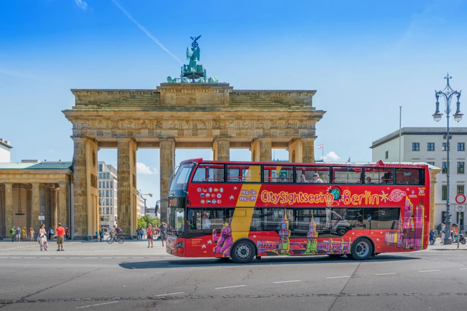 Bus alongside Brandenburg gate