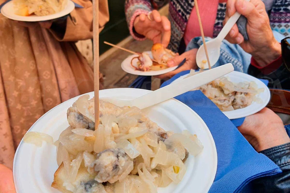 Tasting local food near the canals