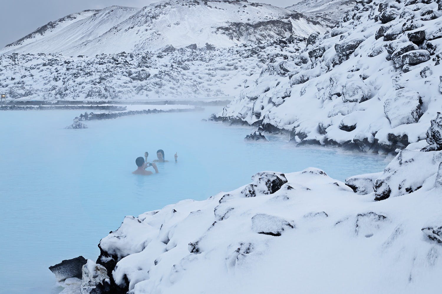 Couples making picture memories in the Blue Lagoon 