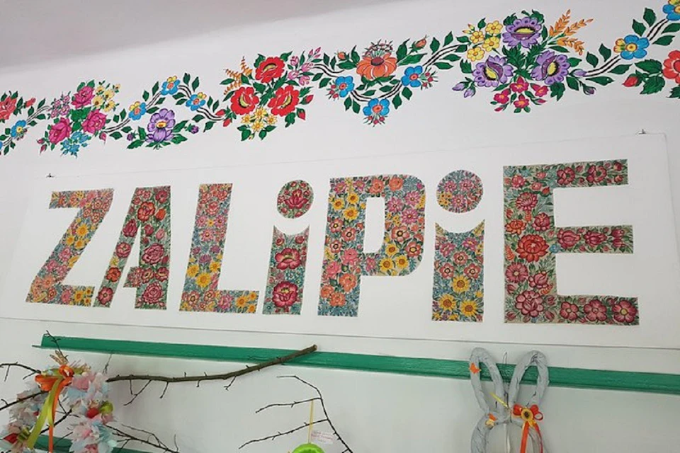 The flower pattern forms the name of the village.