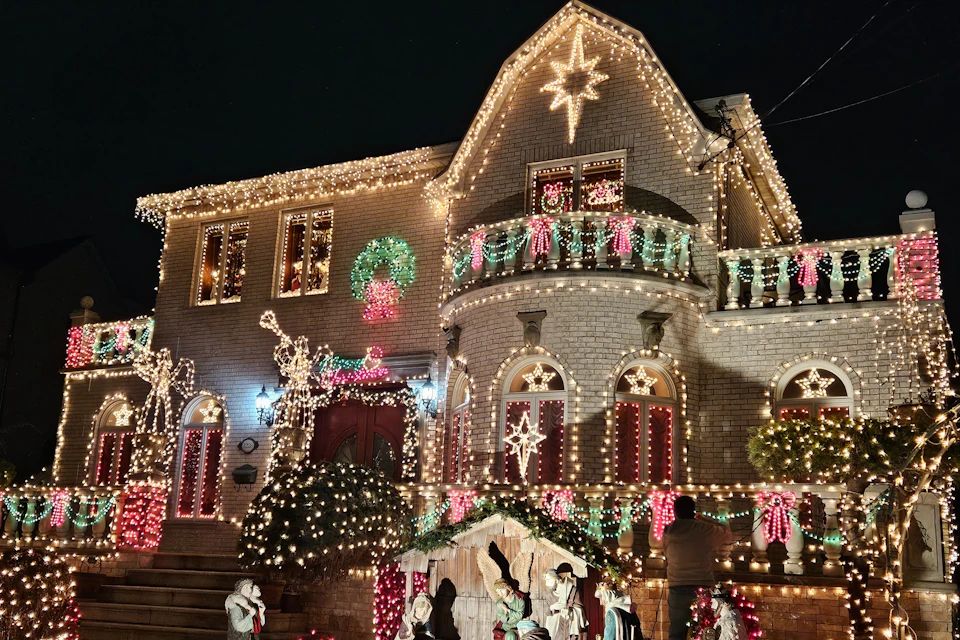 Fairy lights and a nativity scene decorate this house