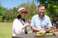 Couple enjoying food and wine at O'Reilly's Vineyard